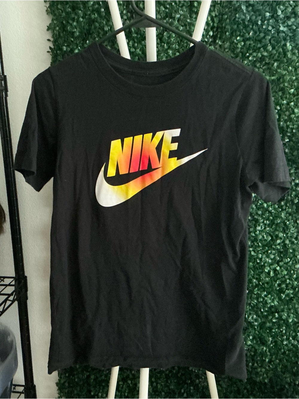 Nike Black Tee with Yellow-Orange Gradient Logo